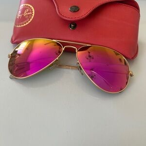 Ray-Ban Gold Frame Sunglasses with Vibrant Pink Lenses